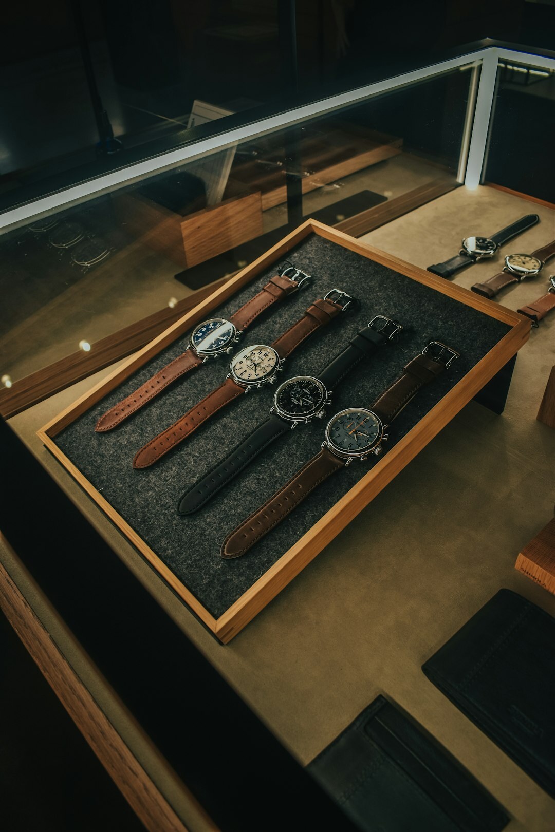 Private boutique viewing room with watches displayed on a velvet tray