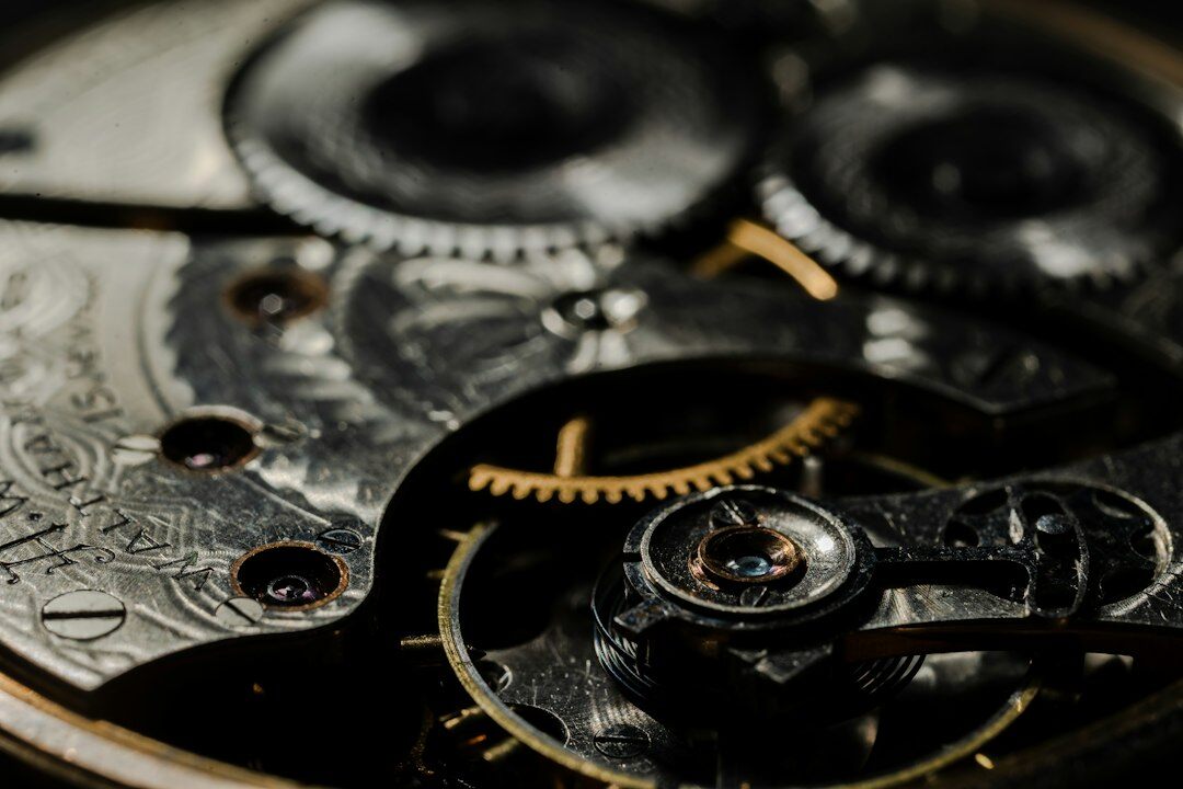 Macro close-up of a Swiss tourbillon watch movement with visible gears