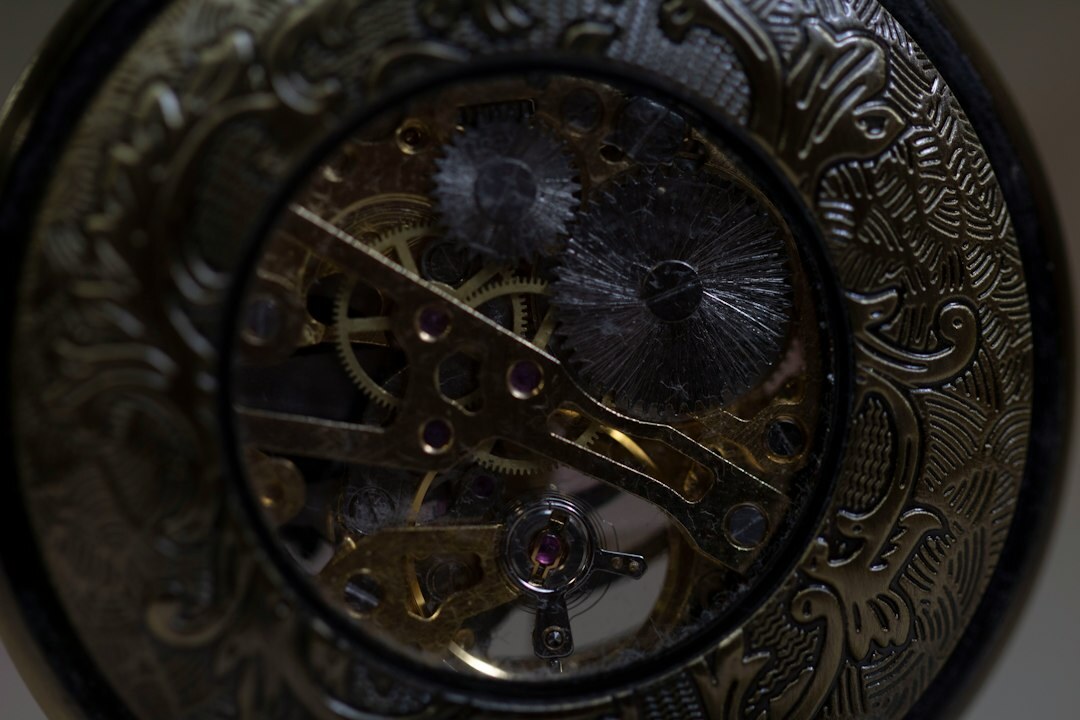 Macro photograph of a skeletonized flying tourbillon watch dial